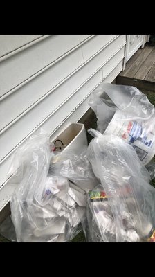 Each bag weighed 30-50lbs plus toilet were left in backyard