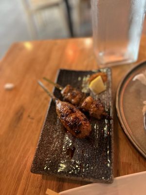 Chicken meatball and negima skewer