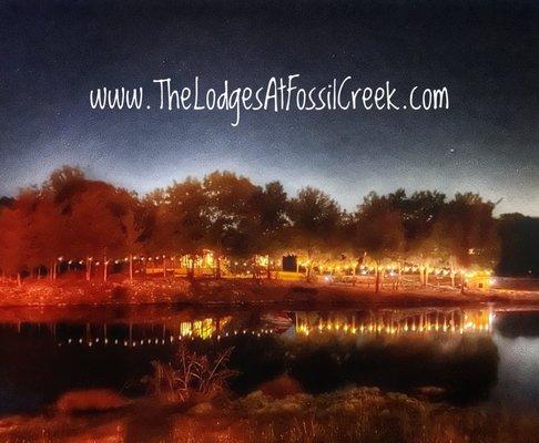 Looking across the lake to the lodges at night.