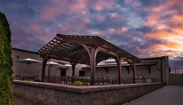 This structure was designed for 40+ people to comfortably sit and eat while protecting them from the sun and rain.