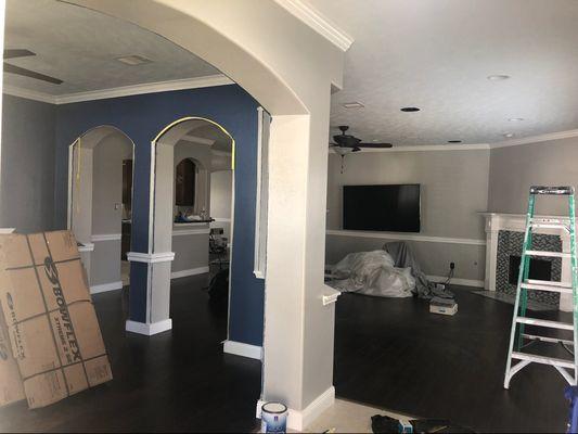 Blue dining room with light gray on living room