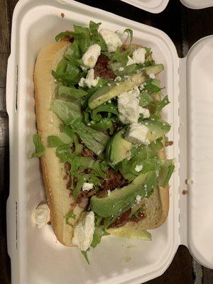 The California dog; bbq sauce, bacon, avocado, lettuce and Feta