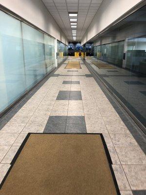 If you enter from Lincoln Ave, walk down this hallway and take a left before the escalators to take the elevator up to the 7th floor.