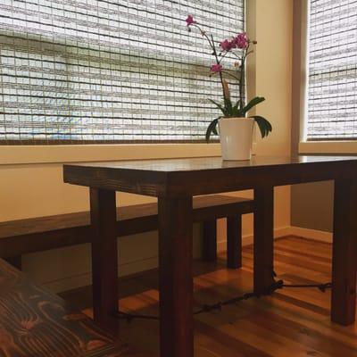 Custom kitchen nook area. Back bench fits two with one on the side. Ability to add to chairs in front and side for a total of 6