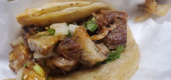 Carnitas taco! Flavorful, crunchy & tender on the inside.  The ASADA are wayyyyy better.