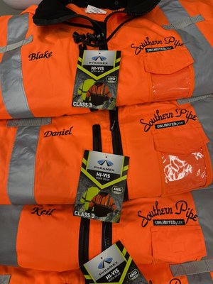 Safety winter jackets by Futura Embroidery & Promotional Solutions with business logo and team names