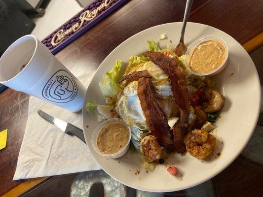 King Phillip's version of the blackened shrimp Zydeco salad and two over easy eggs added with sweetened tea for breakfast