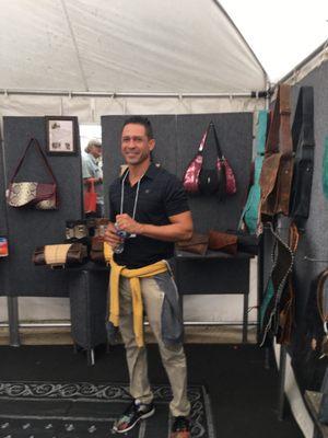 Artist from Miami/Columbia @ Reston Art Fair who made & sold Kate & I our cleverly designed purses.  Hard to resist!