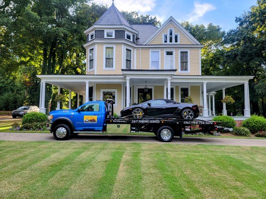 Ferrari being towed by Snoork Towing in Monroe.