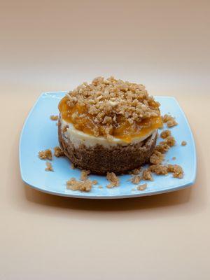 Indulge in our Peach Cobbler Cheesecake, a heavenly blend of creamy cheesecake and spiced peach cobbler, all in one delightful dessert!