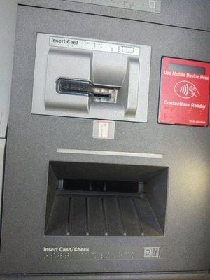 After snatching my ATM card and money, the machine remained in default like this for the duration of my encounter.