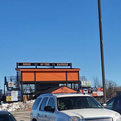 Back parking area near "Raiders" football stadium of the at Almont High School ! So excited to be here and Smile!   :-)  2/4/2024