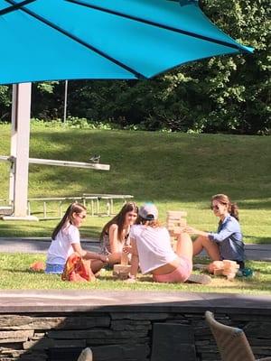 Giant Jenga on the lawn. One of many ways to enjoy your snowcone here.