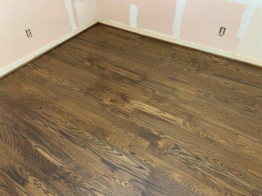 3 1/4" White Oak Select just refinished. Bedroom