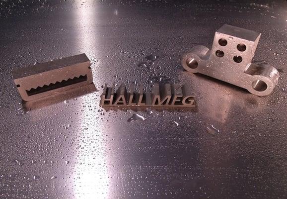 Waterjet cut metal parts.