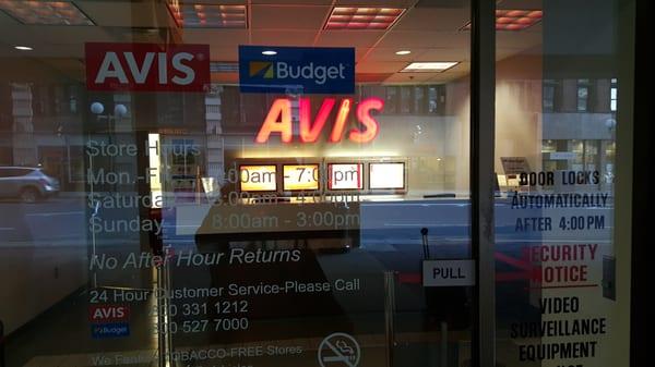 Budget Rental Car Customers are taken at this Avis Rental Car location.