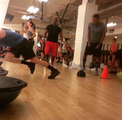 Coach KJs packed circuit training class