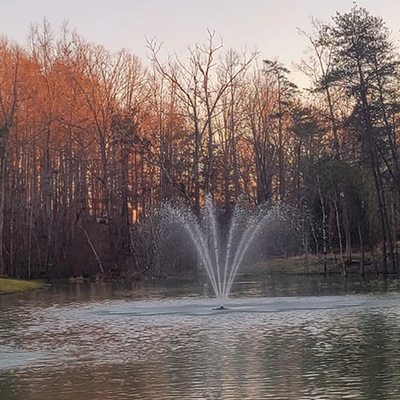 Pond with a Fountain in the Fall of the year.