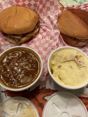 Pulled pork sandwiches, baked beans, potato salad.