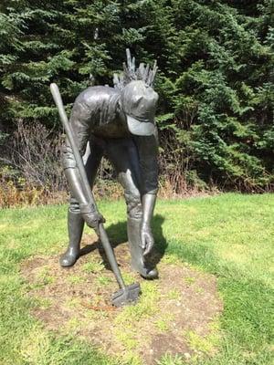 A statues in honor of those that planted after the eruption. Located Forest Learning Center.