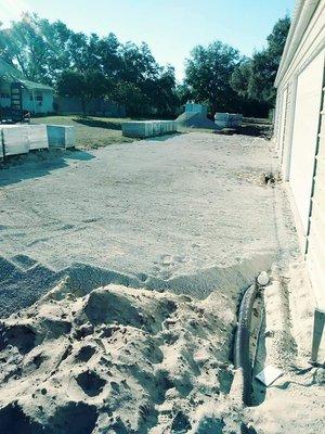 Crushed concrete base for driveway in progress