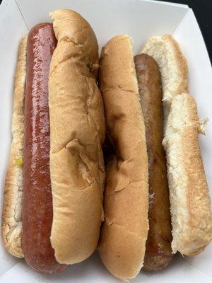 Hot dog and Polish sausage on buns - heated up in microwave.