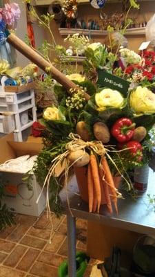 The photo Marcia sent me of the Garden inspired arrangement she made for us.  She even went to the grocery store for veggies!