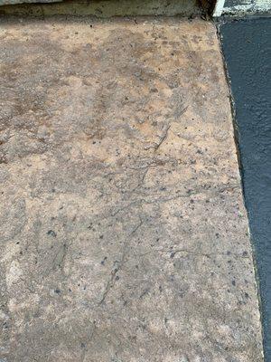 tar speckles all over the concrete