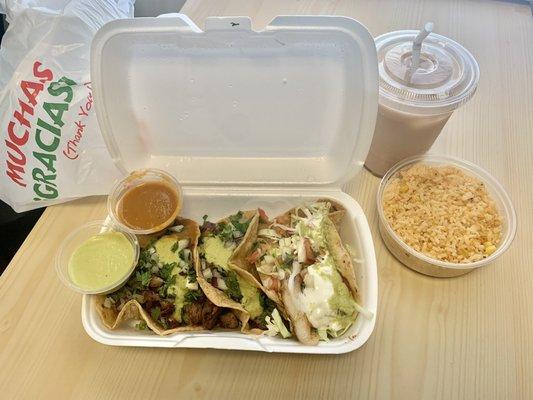 Taco Tuesday Special: Carnitas taco + Asada taco + Grilled Fish taco + Horchata.  Side of Rice