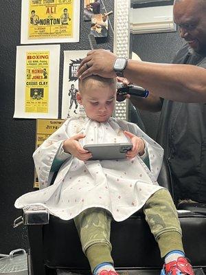 My son getting his ears lowered by Lee.