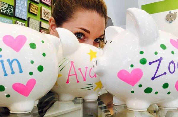 Personalized piggy banks by store owner, Marie. Inspirational signs made in Massachusetts