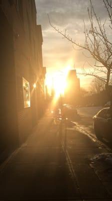 View of the sunrise over NYC from the front of the building.