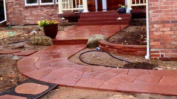 Colorado red flagstone walkway and patio. Also new sprinklers and drip systems