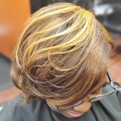 Ginger color with Blonde Highlights and Silk press