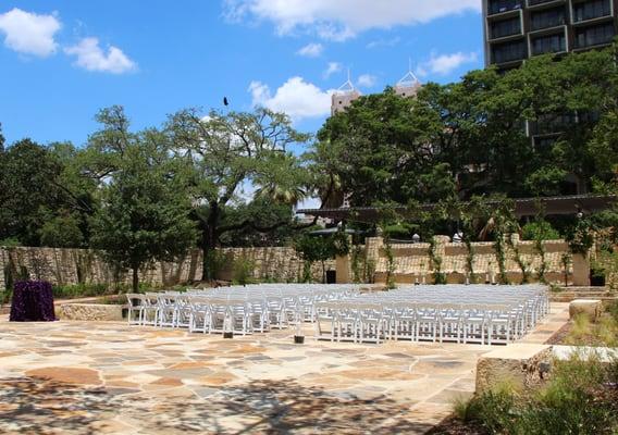 Setting up for an outdoor wedding.