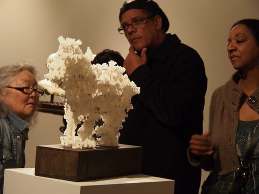 Art enthusiasts viewing art at Vessel Gallery