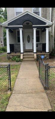 After (sand & painted columns, painted Installed new spindals/ railing, powerwashed porch & walkway)