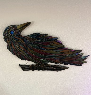 The glass raven we bought while on vacation in Fairbanks, Alaska.