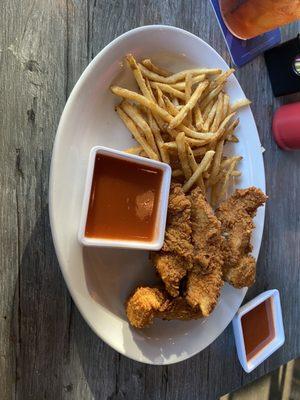 Tender Plate w buffalo sauce with fries.