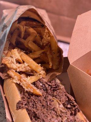 Steak and cheese with Fries (portrait mode).