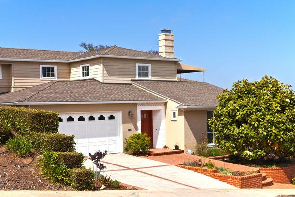 Roof, Concrete and landscape.
 Sunset Home Builders Inc.