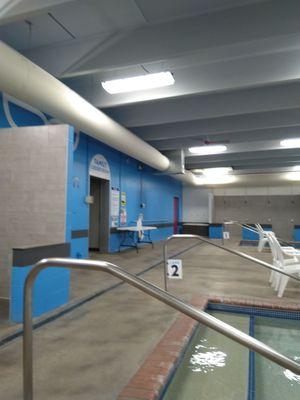 Entrance to dressing rooms and restrooms from the pool area.