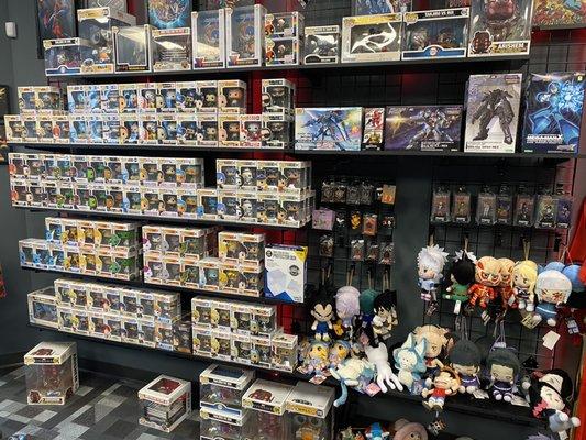 Funko Pops, Gundams, and plushies