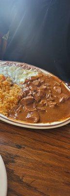 Chile Colorado, rice,  beans.