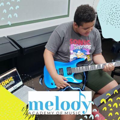 Guitar lessons available at Melody!