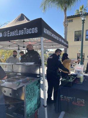 Claremont PD enjoying some tacos at our event.