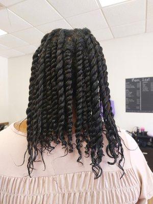 Two strands twist on natural hair.