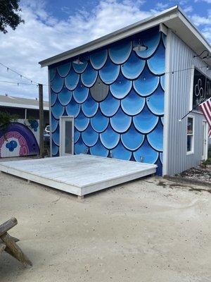 'Large Scale' Mural and stage beside studio