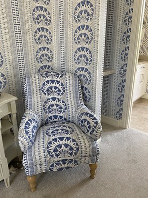 This is a bedroom chair to match the wallpaper