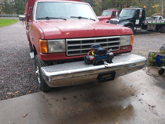 Here is our new service truck, equipped with a 13K pound recovery winch for off road recoveries